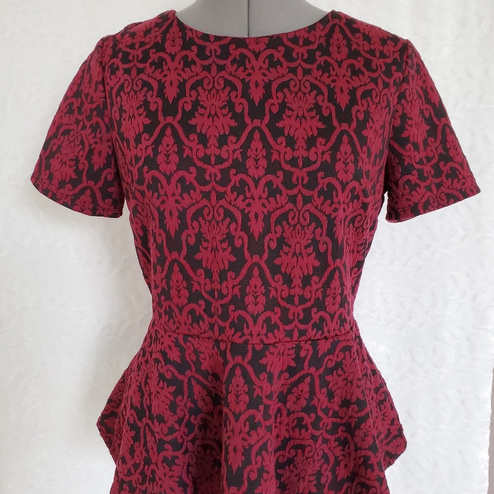 Peplum knit top